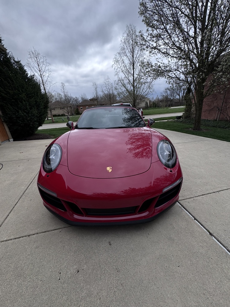 Red Porsche exterior shown after mobile detailing